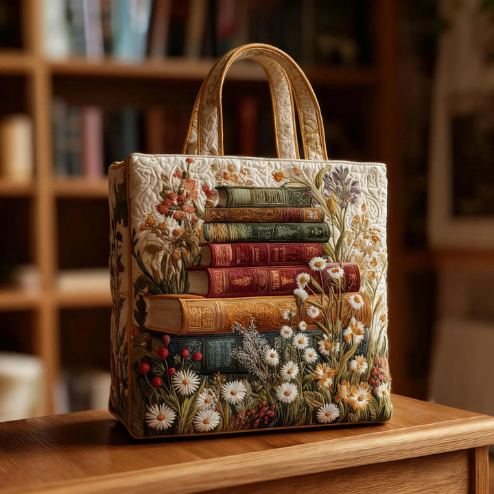 Blommönstrad quiltad handväska