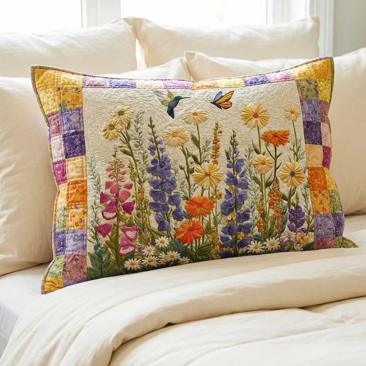 Quiltad kudde med tidlösa blommor